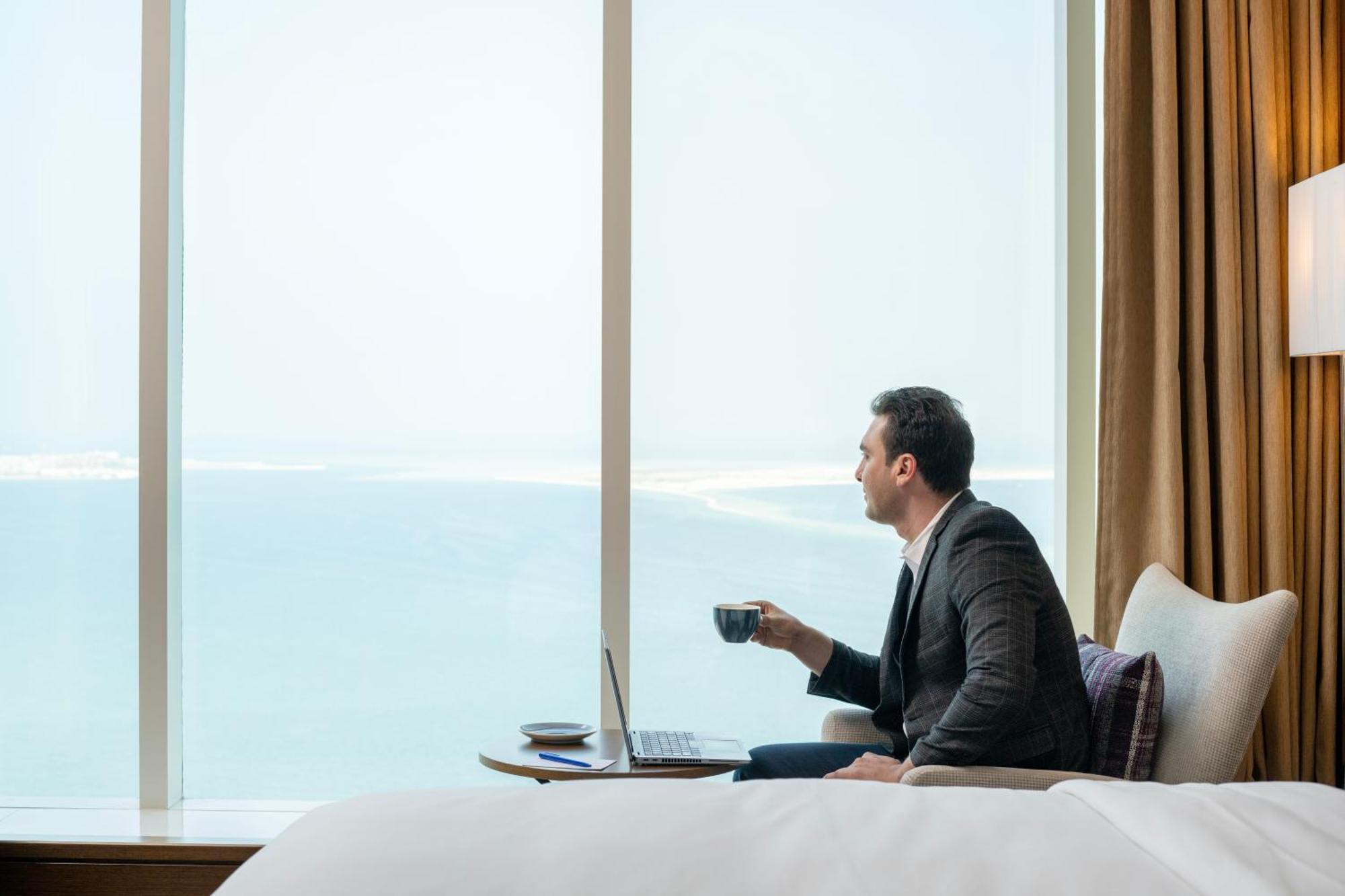 Delta Hotels By Marriott City Center Doha Ngoại thất bức ảnh A guest enjoying the view from a room at the hotel